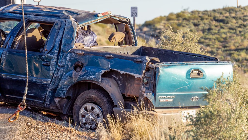 man-rolls-truck-towing-oversized-load,-crashes-through-fence-near-dixie-rock