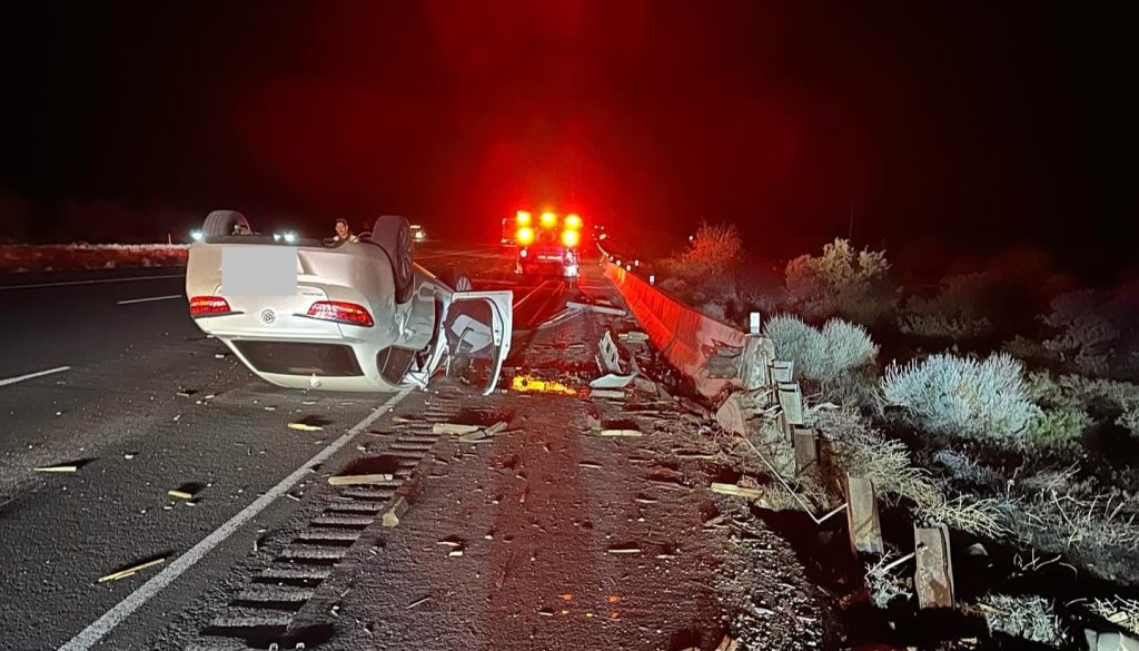Vehicle rolls, hits guardrail on I-15 near Toquerville